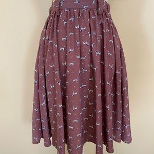 Knee length purple skirt with Dalmatians size xs